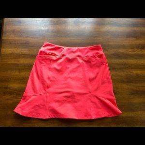 Women’s coral golf skort size Small